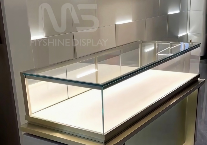 Stainless Steel & Glass Minimalist Jewelry Display Counter with Backlit Base