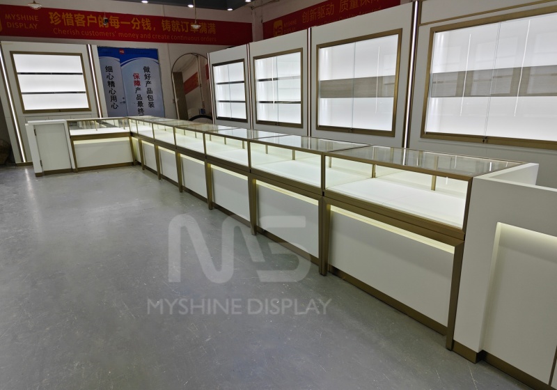 White & Gold Modular Jewelry Store Display Suite with Wall Cabinets