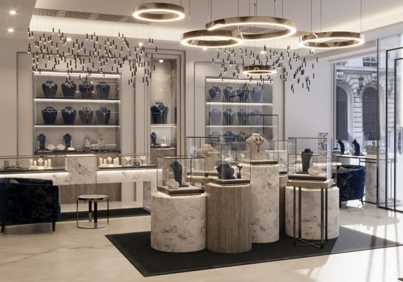 Elegant blue with dark gold Jewelry shop interior design