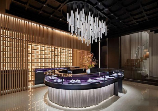 Custom curved island jewelry display cases for high-end jewelry boutiques