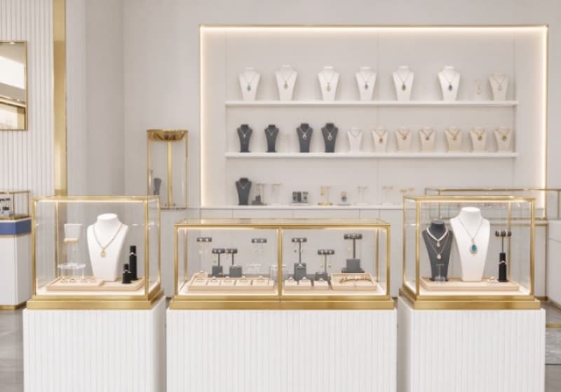 Elegant Gold Frame Jewelry Shop Interior Design
