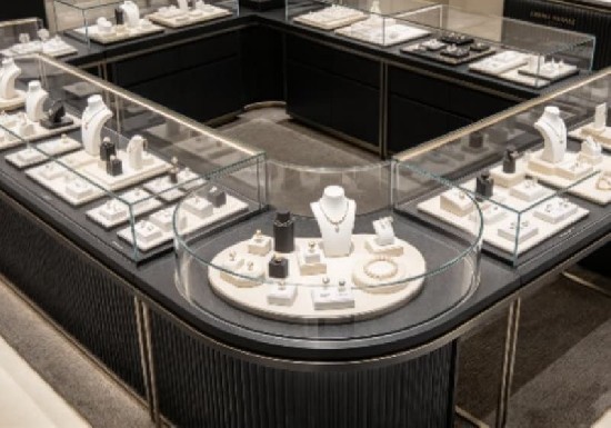 High‑end Black Gold Curved Glass Jewelry Island Display Counter